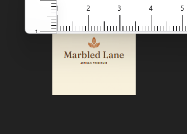 Canva AI generated logo displayed at measured 30 millimetre width with physical ruler for scale reference.
