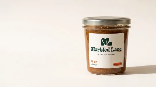 Marbled Lane artisan preserves jar with monochrome forest green label design tested in the Recraft AI for packaging labels review.