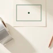 Silver label roll and an approved proof, a job held before printing